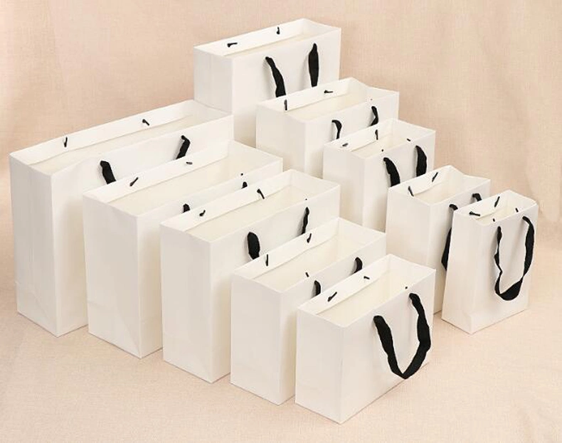 OEM Factory Wholesale Cheap Luxury Gift Shopping Kraft Paper Bag with Custom Logo